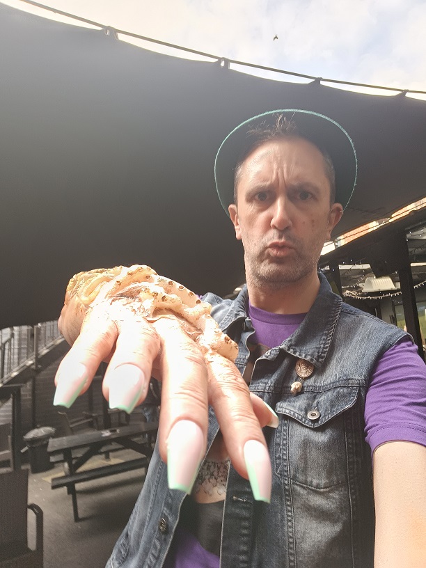 Nathan Head doubling as The Mogern's forearm in the original ending